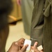 Marine recruits fitted for uniforms on Parris Island