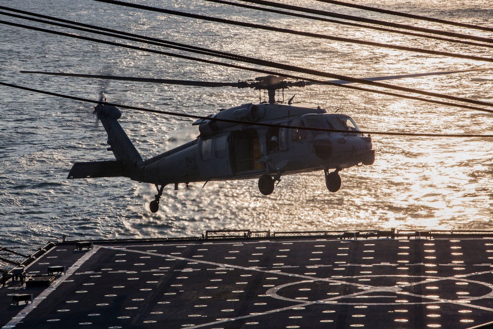 USS Oak Hill conducts flight operations aboard ship