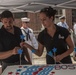 Montilo's bakery workers prepare ceremonial cake during the start of the annual Boston Harborfest