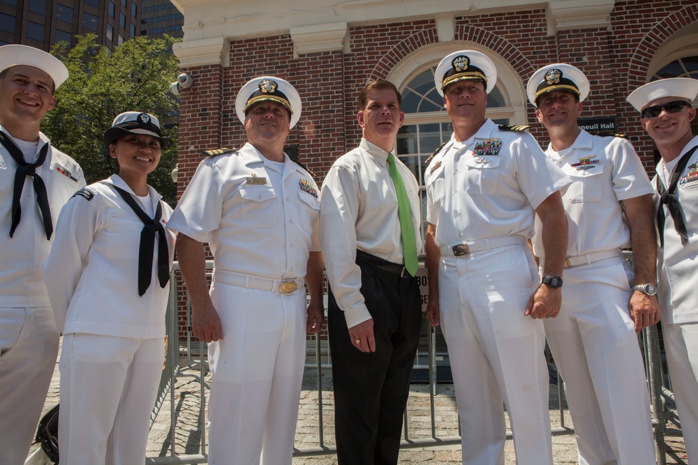 Mayor of Boston Marty Walsh welcomes the sailors of the USS Oak Hill and the USS Constitution during the annual Boston Harborfest