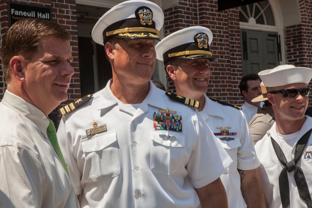 Boston Mayor Marty Walsh welcomes sailors with the USS Oak Hill and the USS Constitution during the annual Boston Harborfest