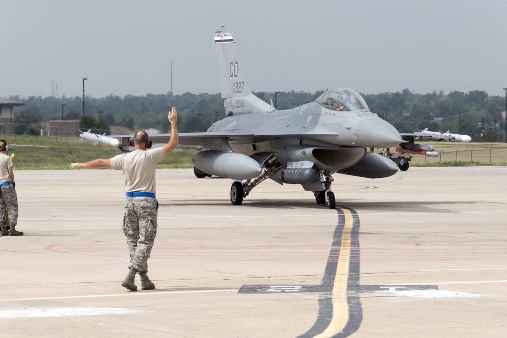 Colorado Air National Guard F-16s say goodbye as they depart Denver International Airport