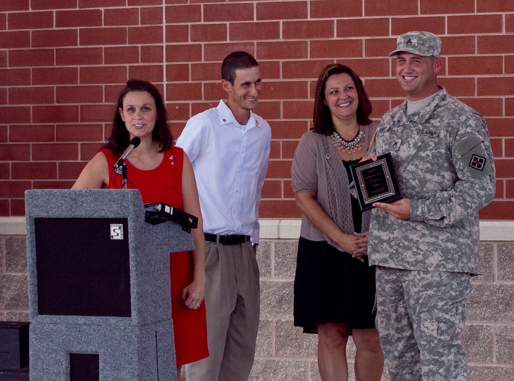 Scialdo brother and sisters with Staff Sgt. Loebs