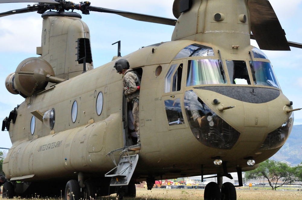 Chinook helicopter participating in rescue mission exercise.  