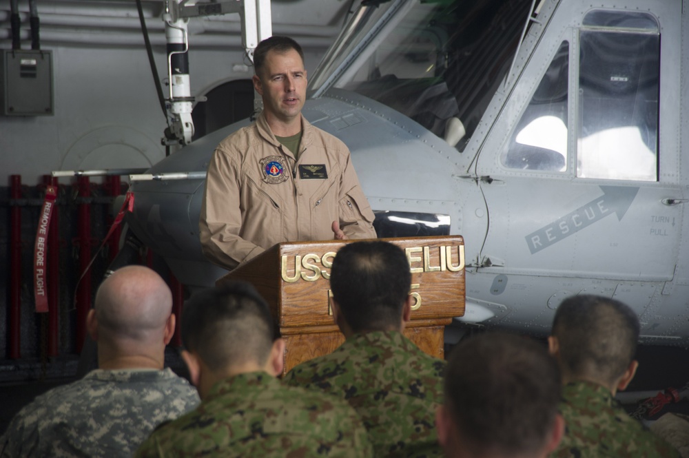 Distinguished visitors aboard USS Peleliu during RIMPAC 2014