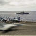 USS Reagan maneuvers with LCS