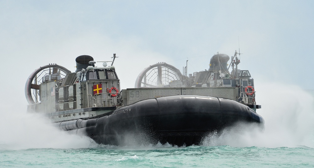 Amphibious assault vehicle beach landing