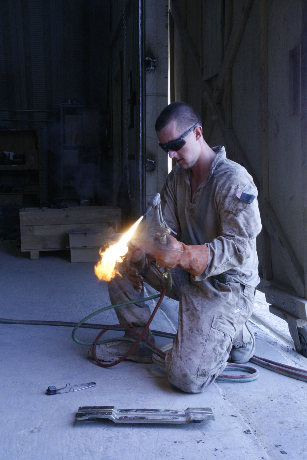 1/2 Motor transport Marines aid Camp Leatherneck while retrograding vehicles home