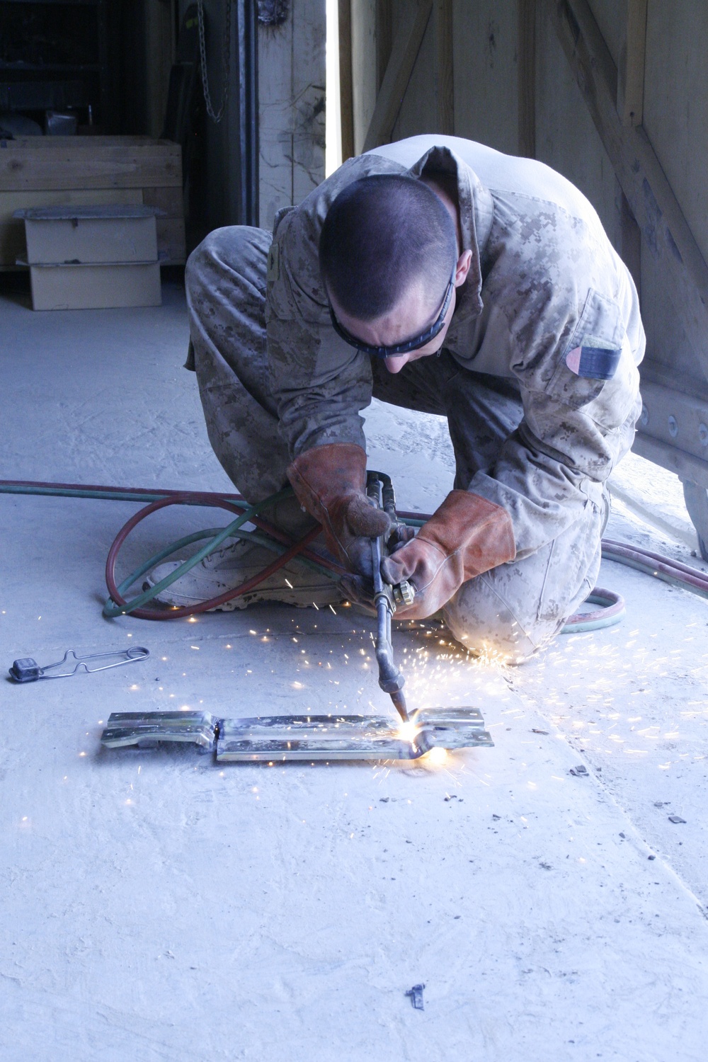 1/2 Motor transport Marines aid Camp Leatherneck while retrograding vehicles home