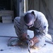 1/2 Motor transport Marines aid Camp Leatherneck while retrograding vehicles home