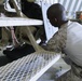 1/2 Motor transport Marines aid Camp Leatherneck while retrograding vehicles home