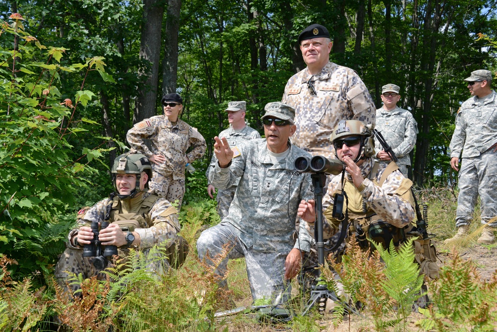 Adjutant General Maj General Vadnais speaks with Latvian Soldiers