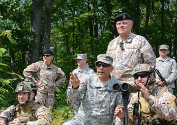 Adjutant General Maj General Vadnais speaks with Latvian Soldiers
