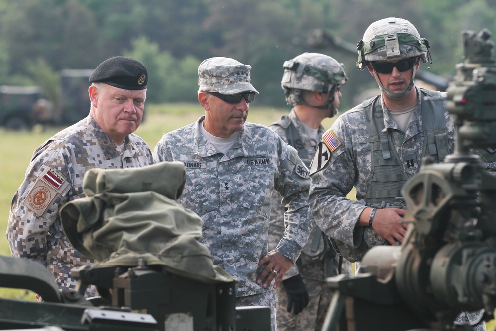 Maj. Gen. Gregory J. Vadnais, Adjutant General and Director of Military and Veterans Affairs for the Michigan National Guard, and Lt. Gen. Raimonds Graube, Latvian Chief of Defense visit 119 FA