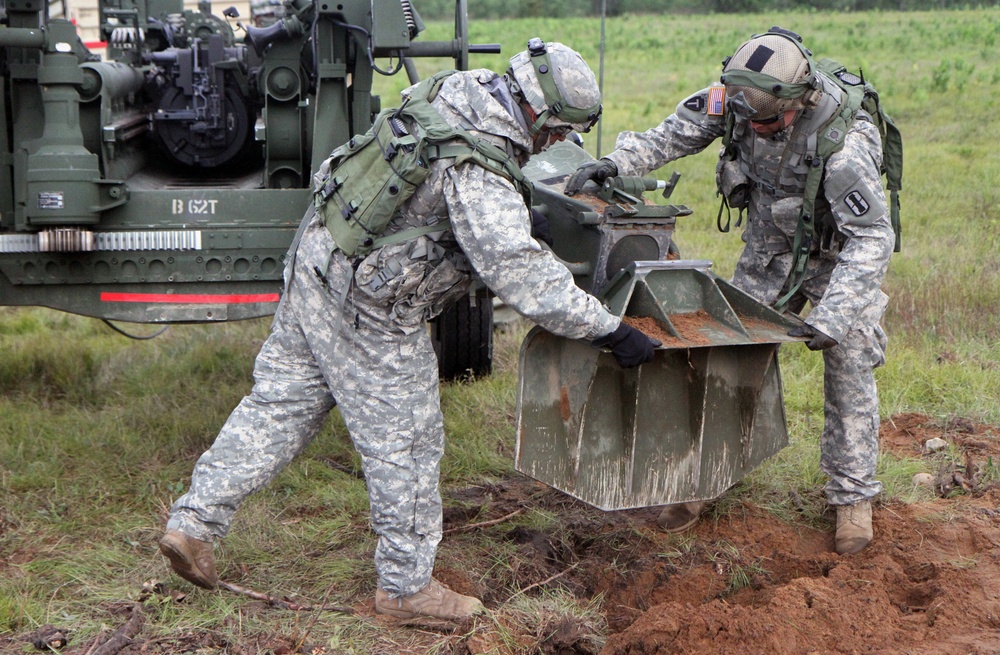 1-103rd Field Artillery perform position occupation at Camp Grayling, Michigan, during XCTC 2014