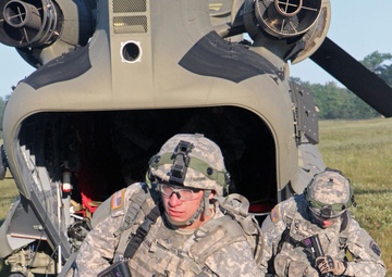 1-119 Field Artillery raid exercise breaks CGJMTC round distance charge record at XCTC 2014, Camp Grayling, Michigan