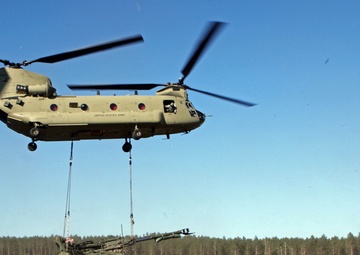 1-119 Field Artillery raid exercise breaks CGJMTC round distance charge record at XCTC 2014, Camp Grayling, Michigan