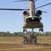 1-119 Field Artillery raid exercise breaks CGJMTC round distance charge record at XCTC 2014, Camp Grayling, Michigan