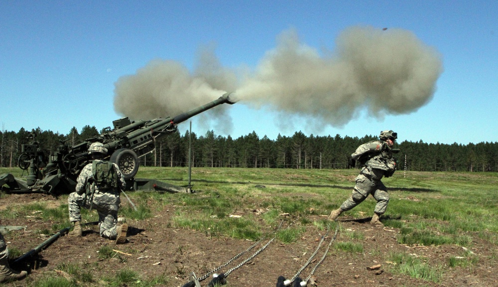1-119 Field Artillery raid exercise breaks CGJMTC round distance charge record at XCTC 2014, Camp Grayling, Michigan