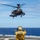 AH-64E landing qualifications on USS Peleliu, RIMPAC 2014