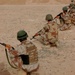 Iraqi soldiers fire weapons at rifle range in Al Qaim