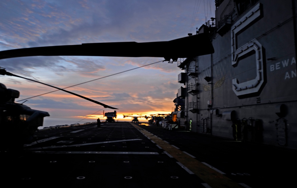 USS Peleliu sails into the sunset during RIMPAC 2014