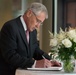 Hagel signs condolence book