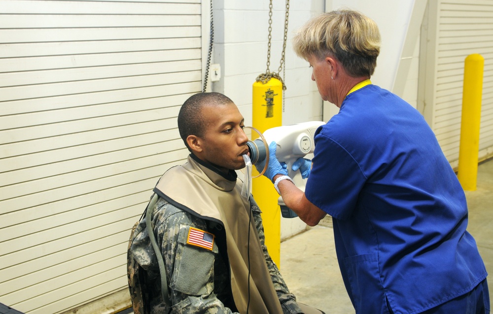 Dental staff checks Soldier's teeth
