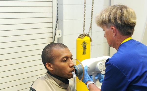 Dental staff checks Soldier's teeth