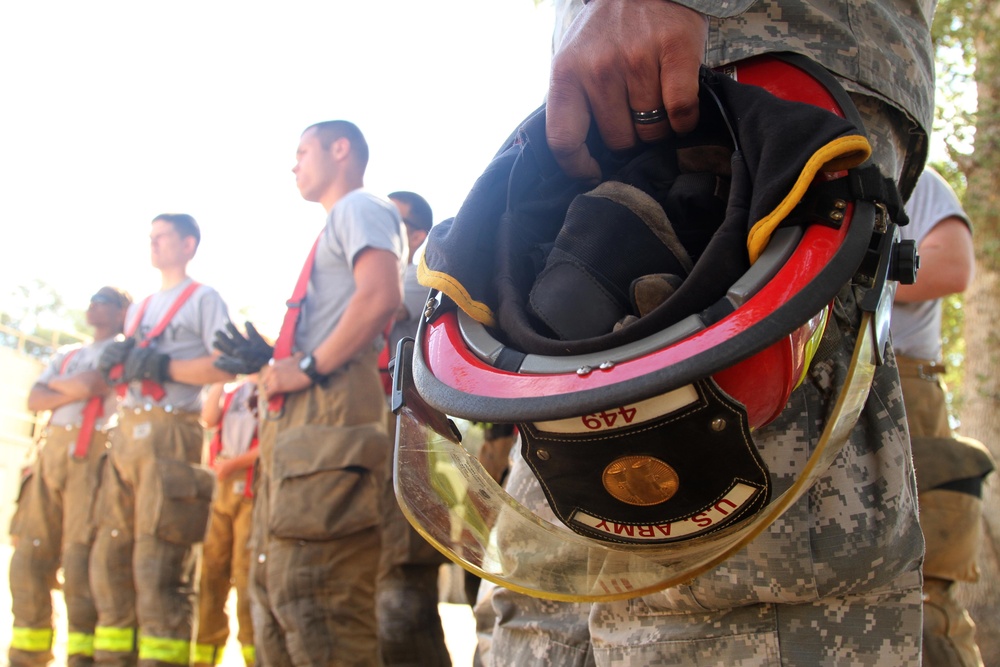 Soldier firefighters listen to safety brief