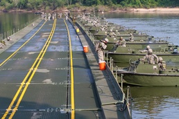 Engineers compose bridge across Arkansas River