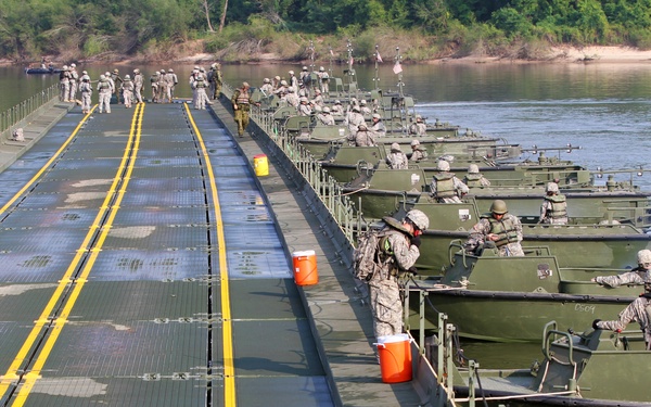 Engineers compose bridge across Arkansas River