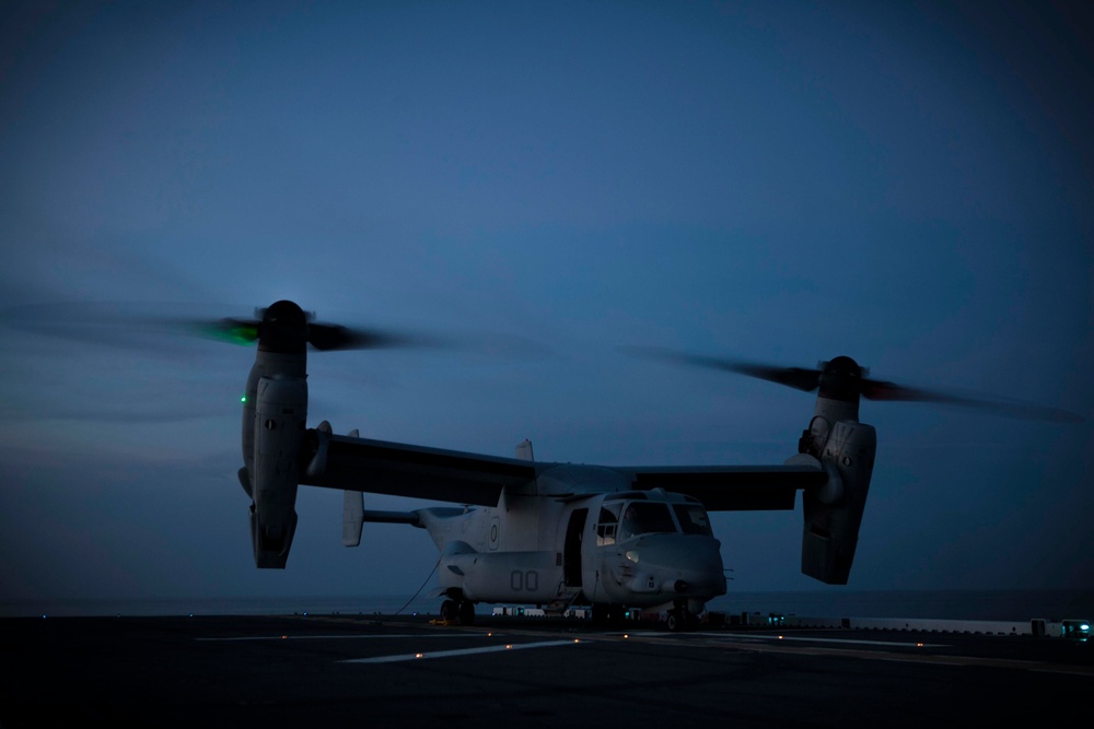 Night flight operations build aboard USS America