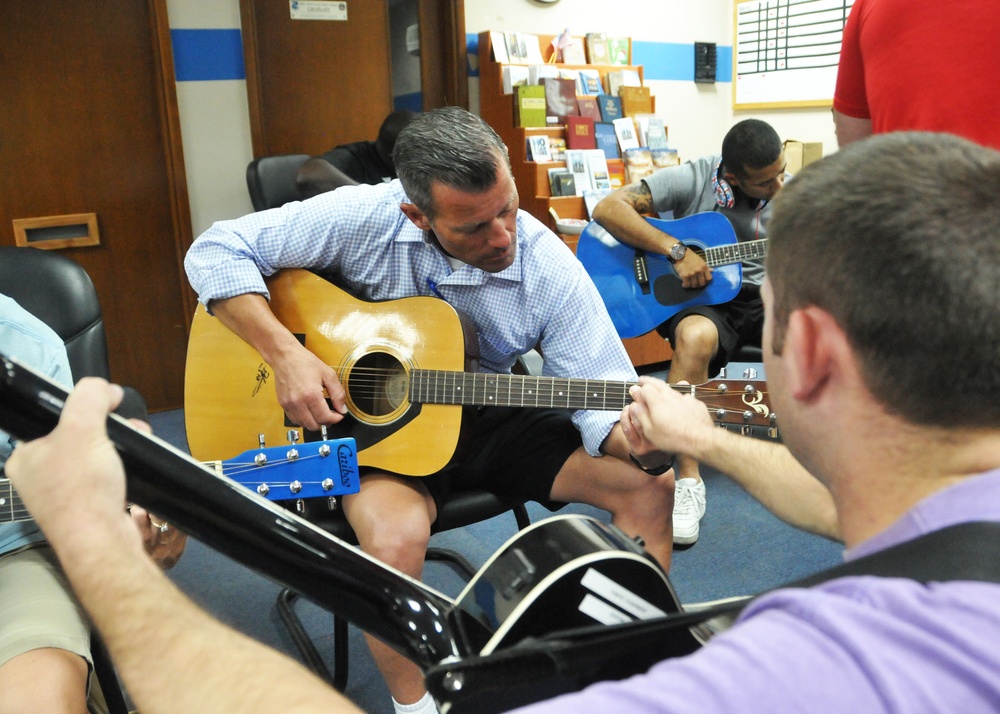 Guitar class strikes a chord with Airmen