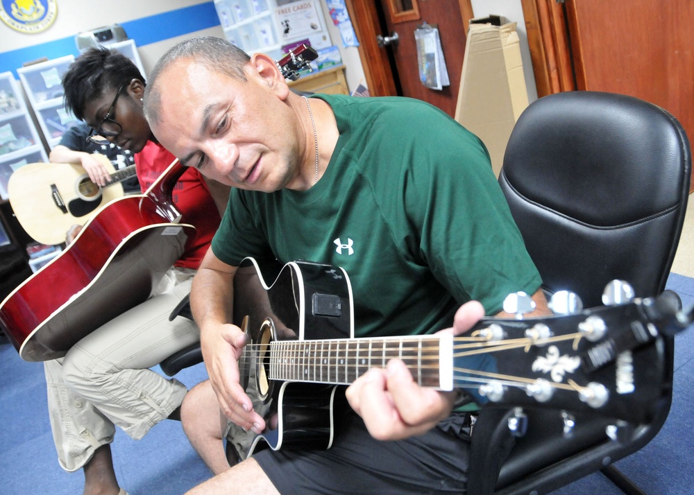 Guitar class strikes a chord with Airmen