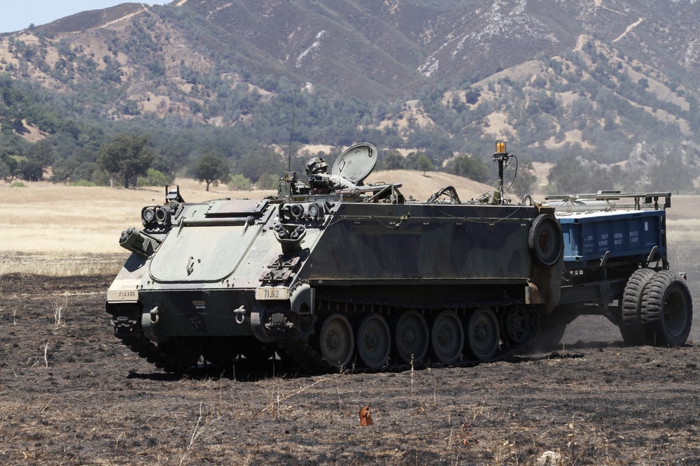 744th M113 APC on the move