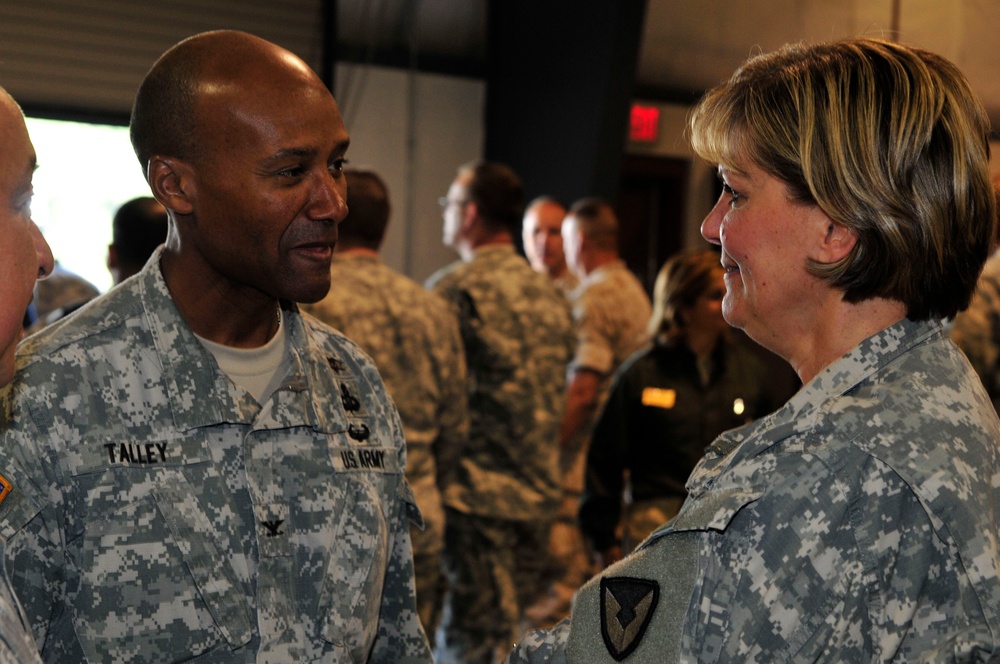 Col. Talley speaks with Lt. Gen. McQuistion following a Vibrant Response overview briefing