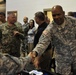 Maj. Gen. Smith visits with soldiers in the Vibrant Response command center
