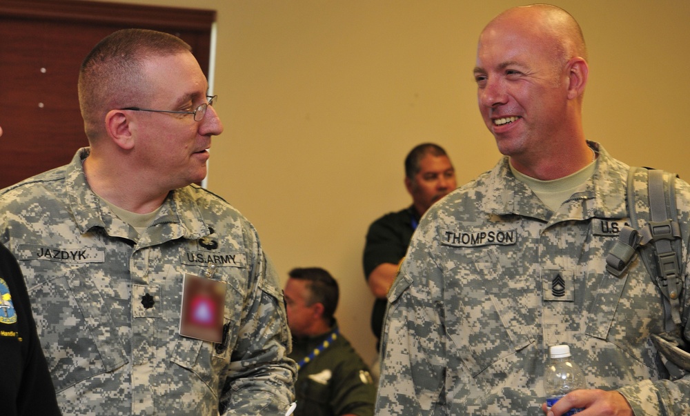 Master Sgt. Thompson from the Army Public Affairs Center visits with Lt. Col. Jazdyk