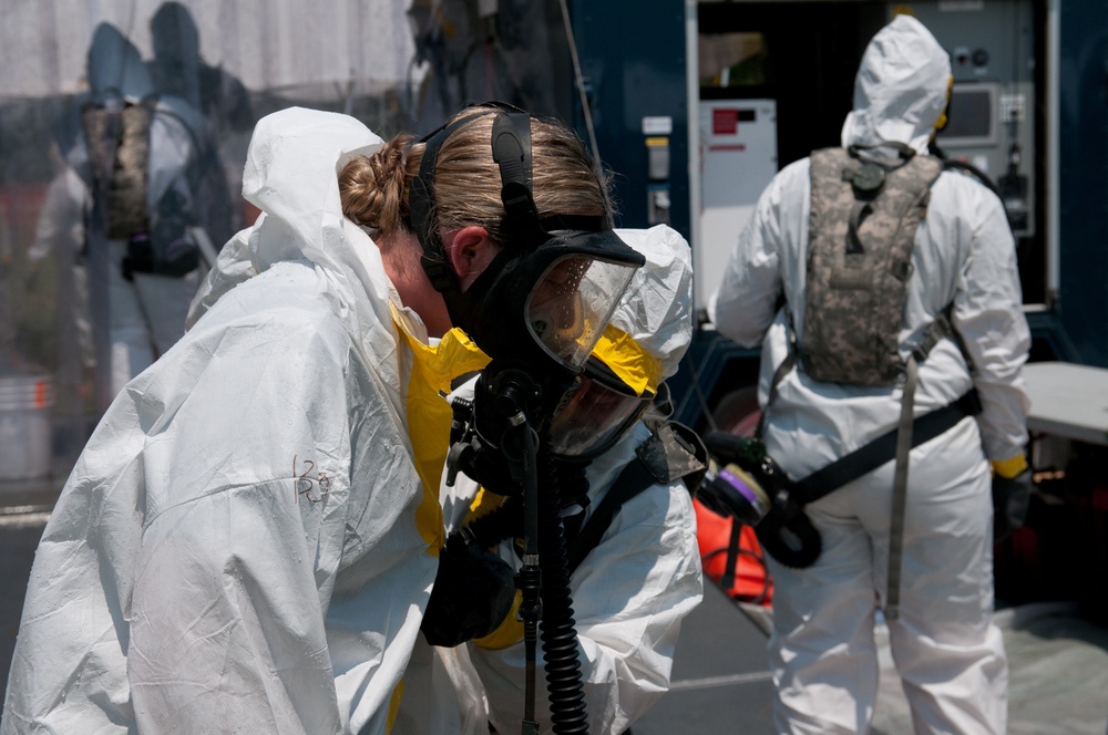 Soldiers shower for decontamination training