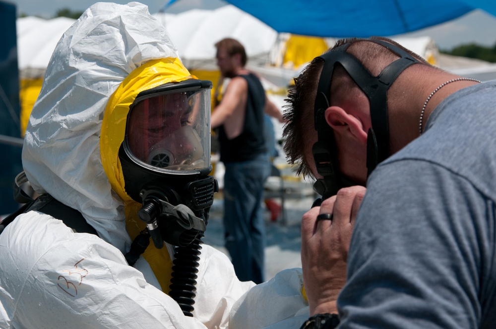 Soldiers shower for decontamination training