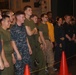 Marines and Sailors enjoy live entertainment aboard the Bataan