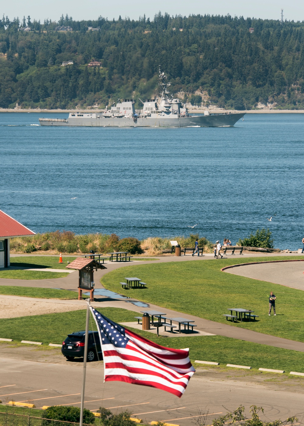 he Arleigh Burke-class destroyer USS Howard (DDG 83) passes the Mukilteo Lighthouse park on her way to Naval Station Everett