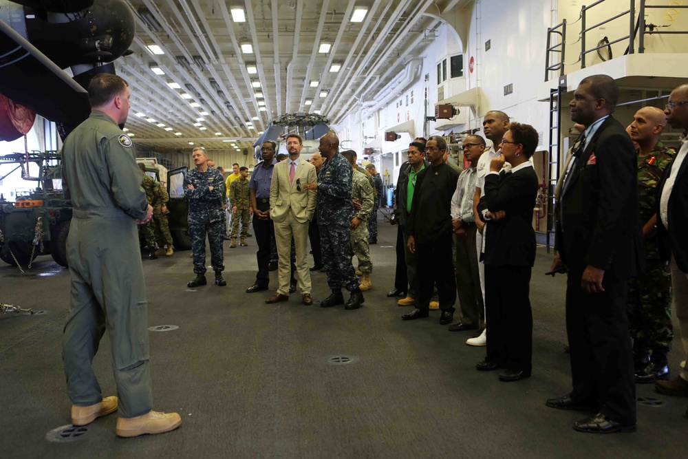 Diplomats, military leaders, distinguished guests from Trinidad tour USS America