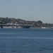The Wasp-class amphibious assault ship USS Essex (LHD 2) prepares to moor in Seattle for the Navy's annual Seafair celebration