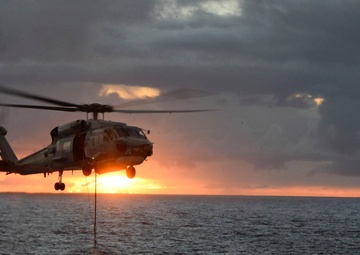 HMAS success conduct transfer operations with USCG Cutter Waesche