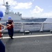 USCG Waesche conduct a hand-line transfer with PLA(N) ship Yueyang during RIMPAC 2014