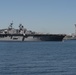 The Wasp-class amphibious assault ship USS Essex transits Elliott Bay during a parade of ships to kick off Seafair week