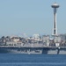 The Wasp-class amphibious assault ship USS Essex (LHD 2) transits Elliott Bay during a parade of ships to kickoff Seafair week
