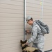 Military working dog and handler practice explosives detection